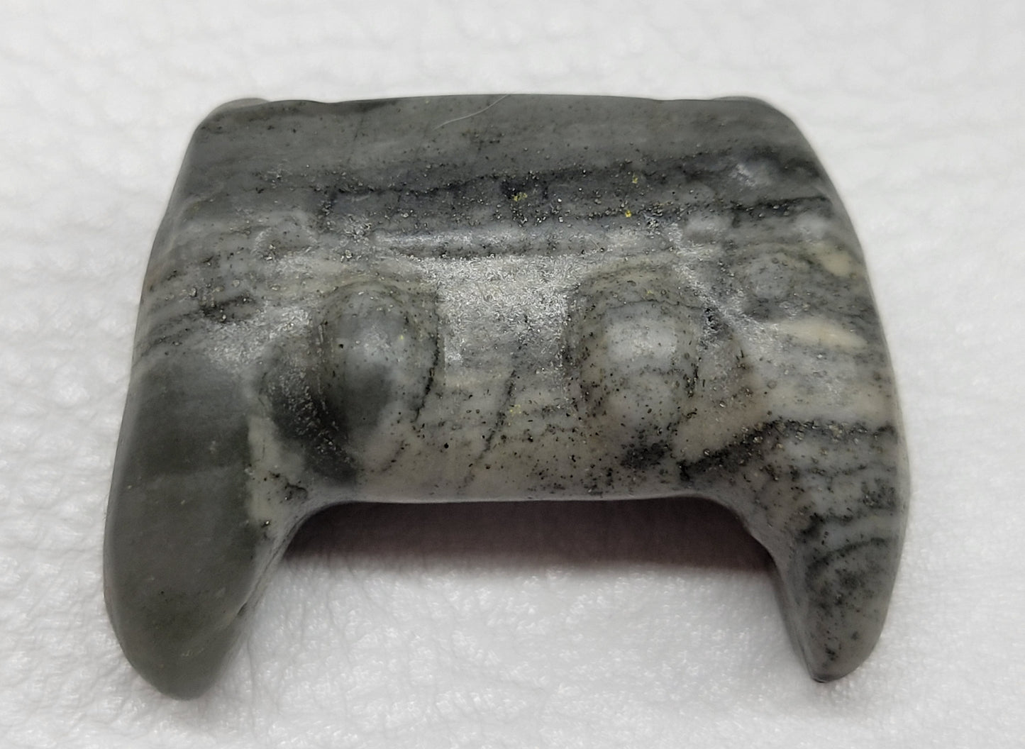Game controller carvings
