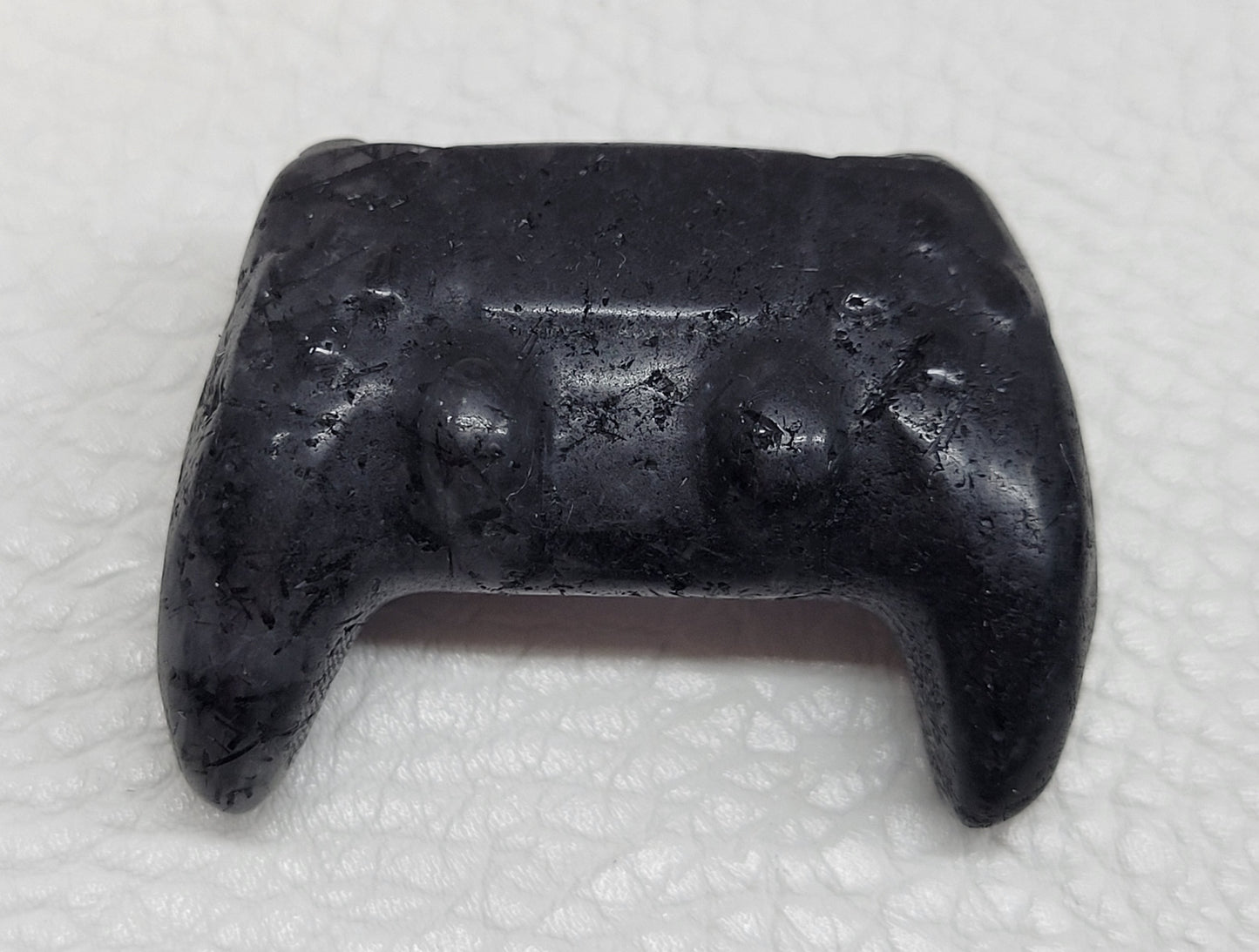 Game controller carvings
