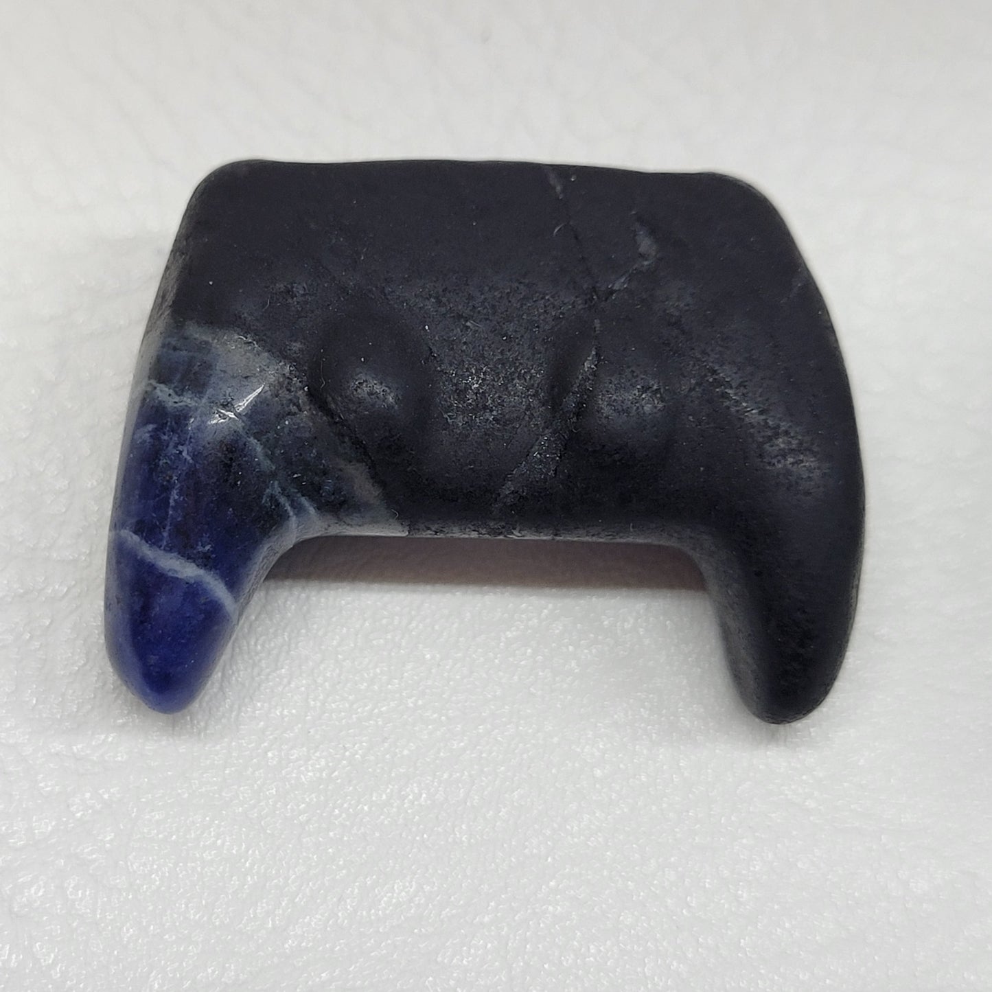 Game controller carvings