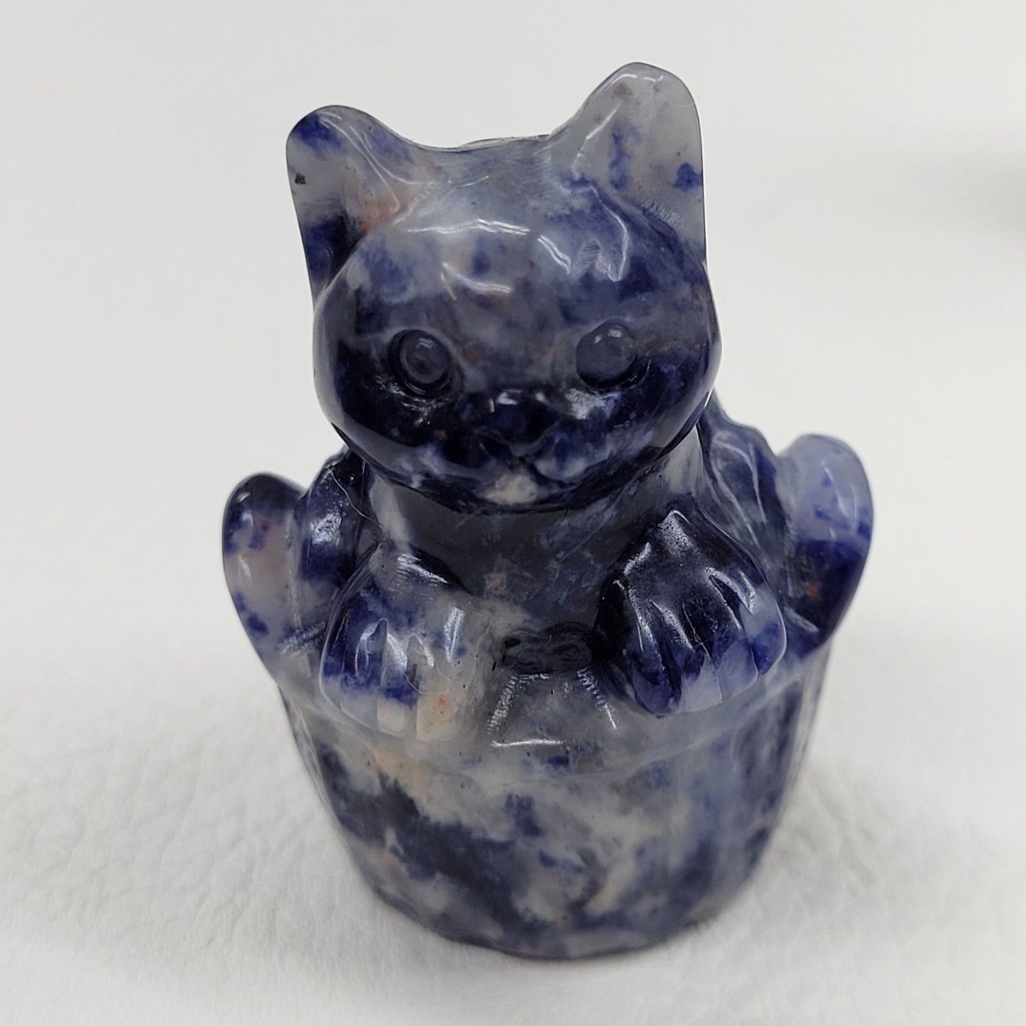 Cat in a basket carving