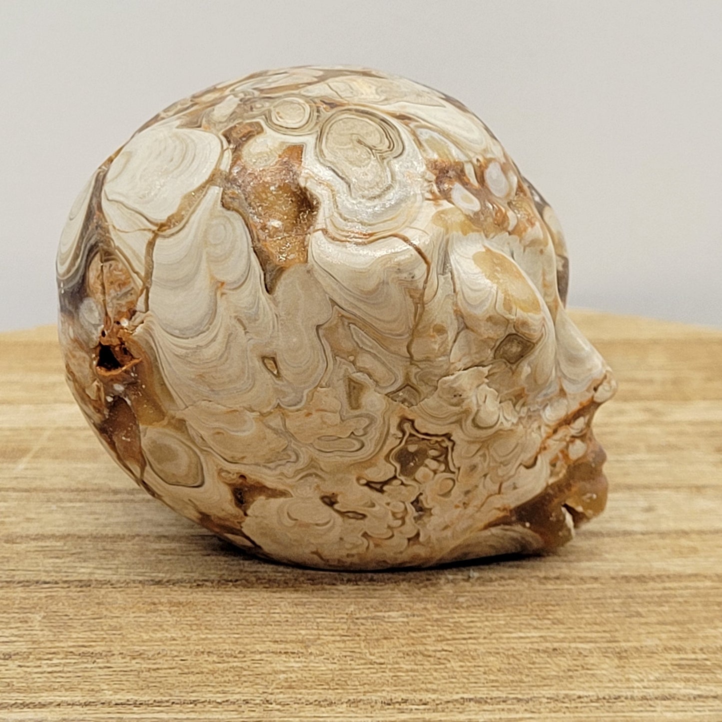 Alien head carving - Amber Calcite (M)