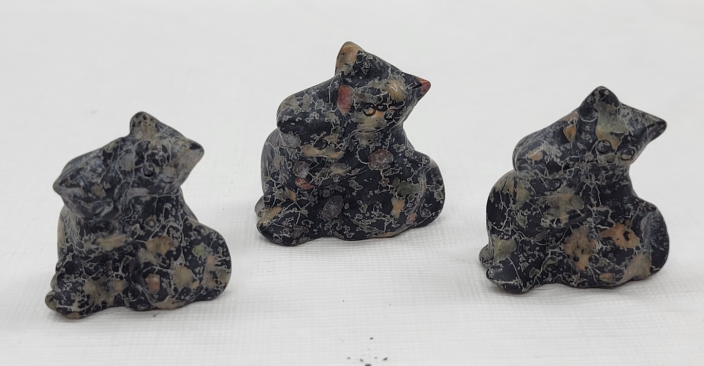Hugging cat carvings (small)