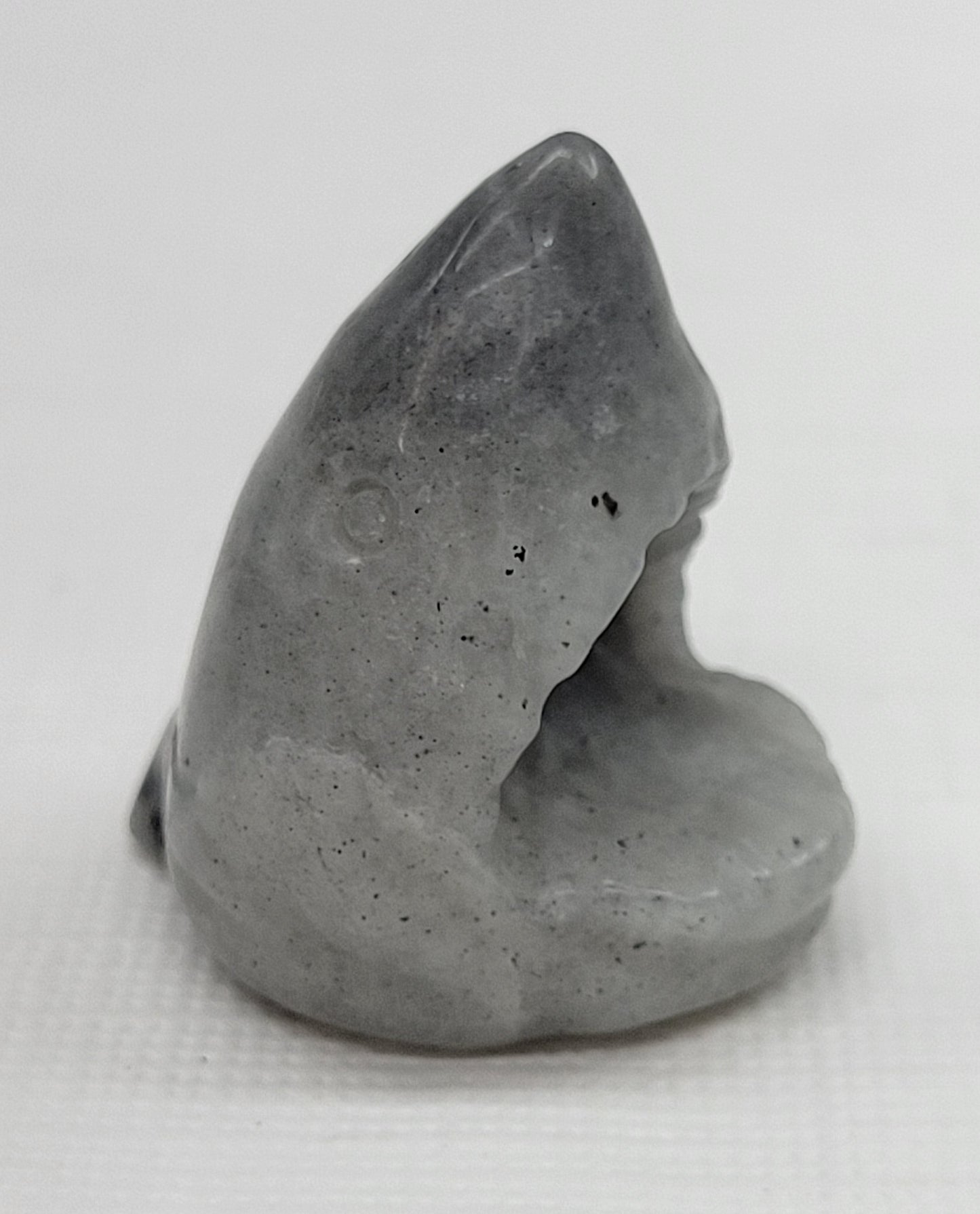 Shark head carvings