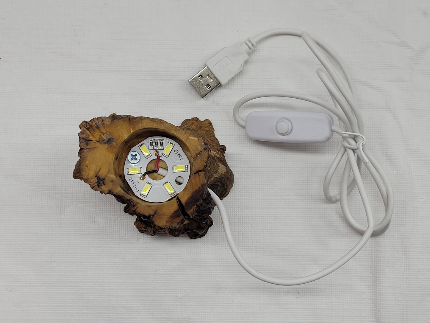 Lighted sphere stand - wood stump