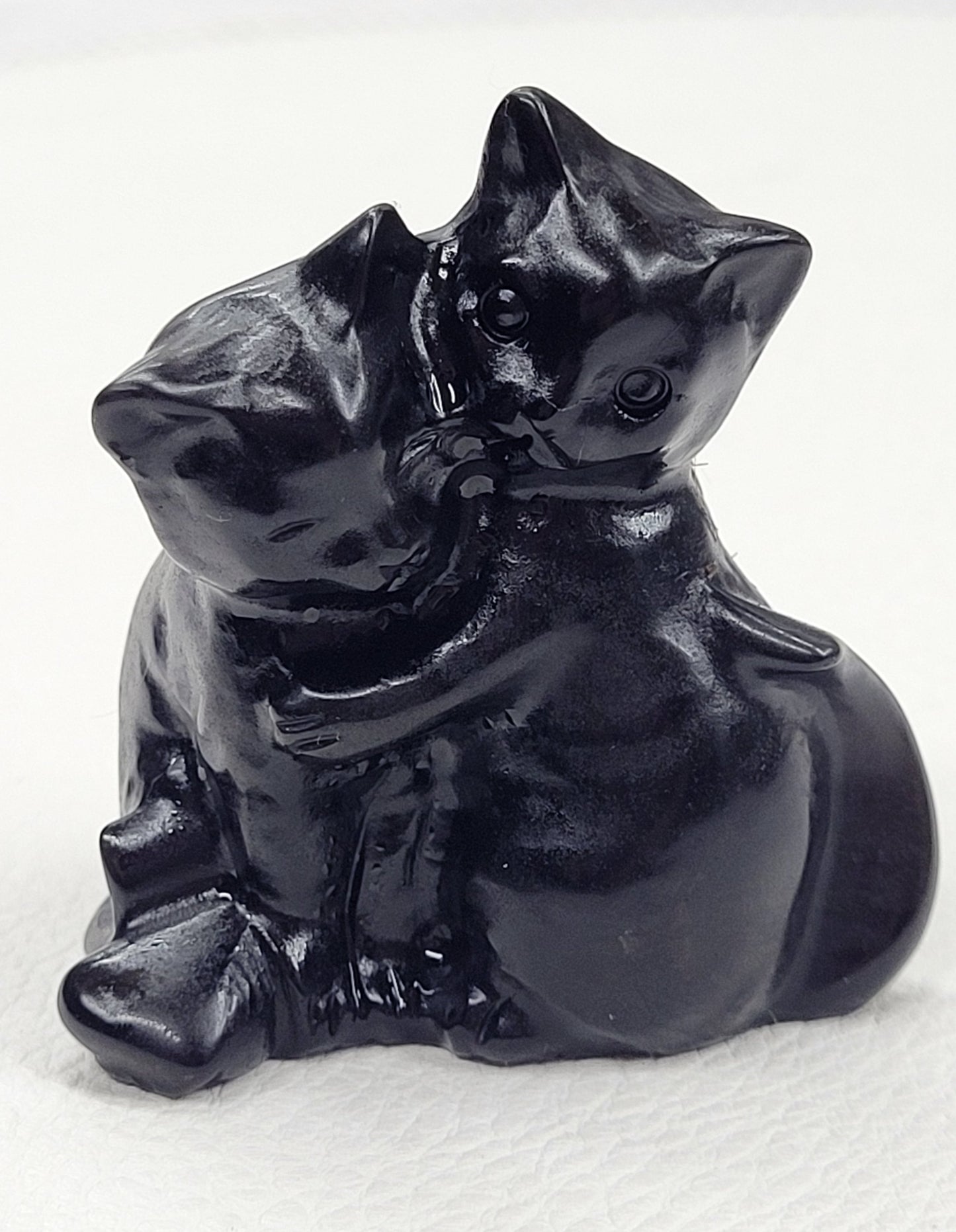 Hugging cat carvings (medium)