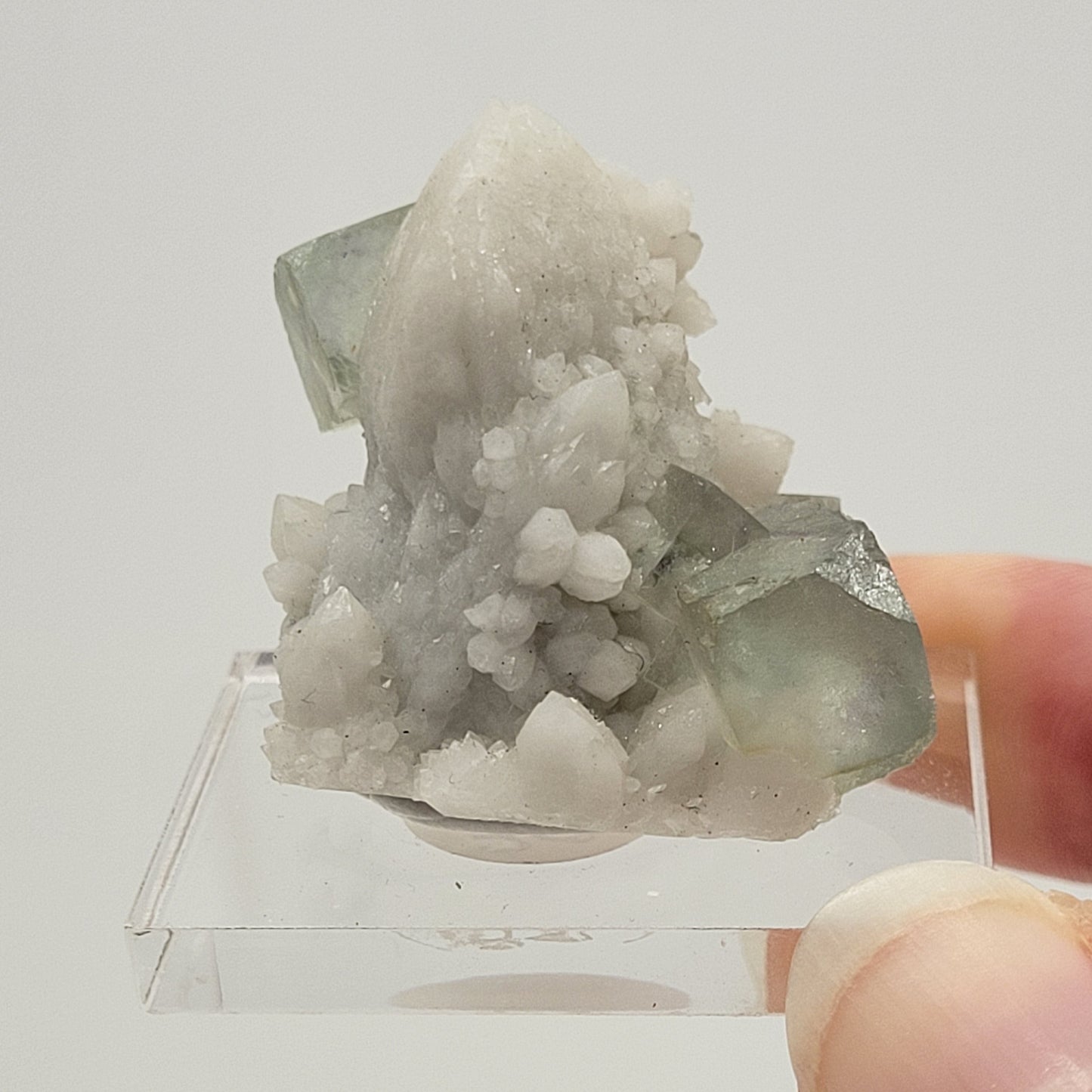 Fluorite on Candle Quartz - China
