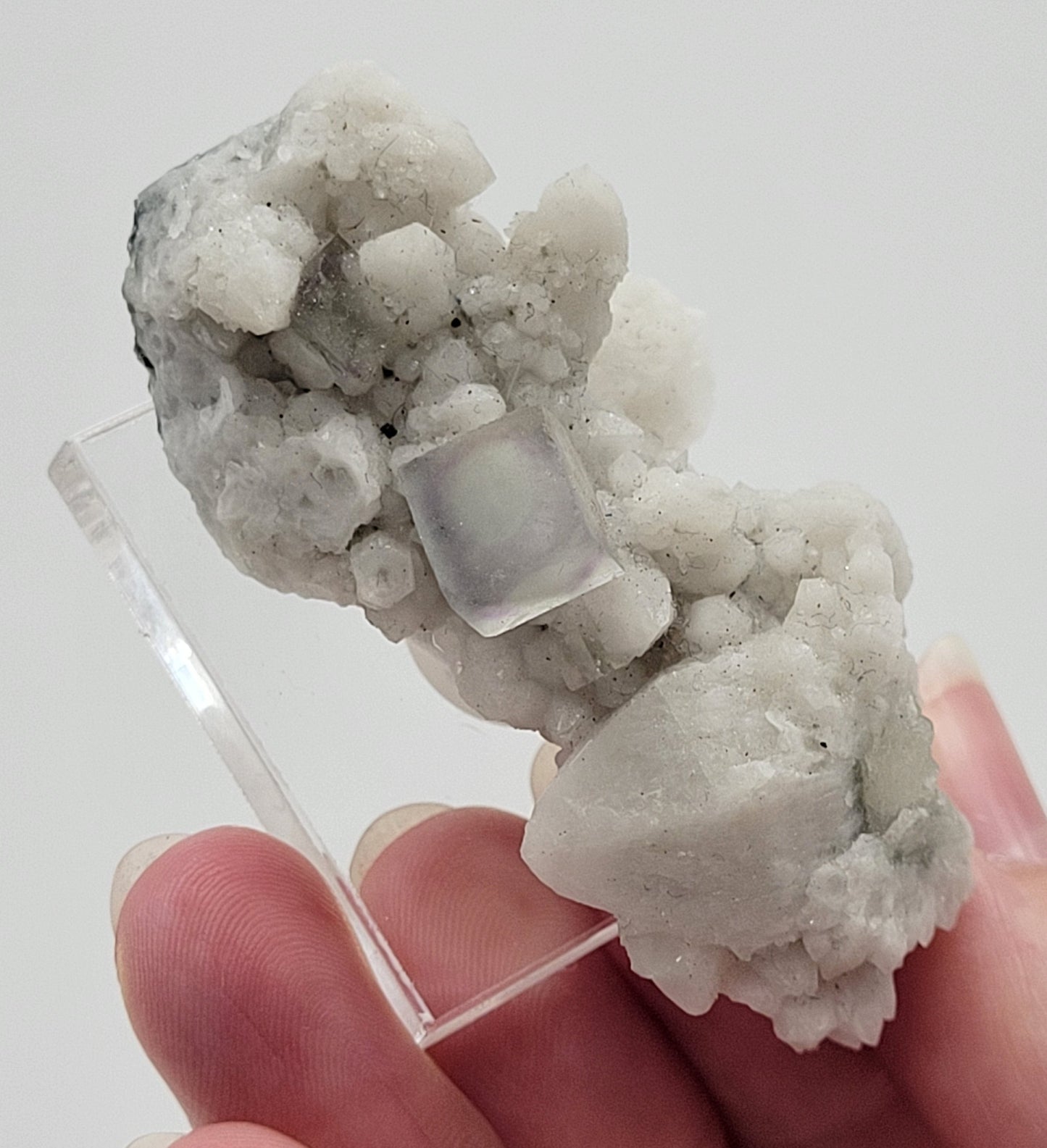 Fluorite on Candle Quartz - China