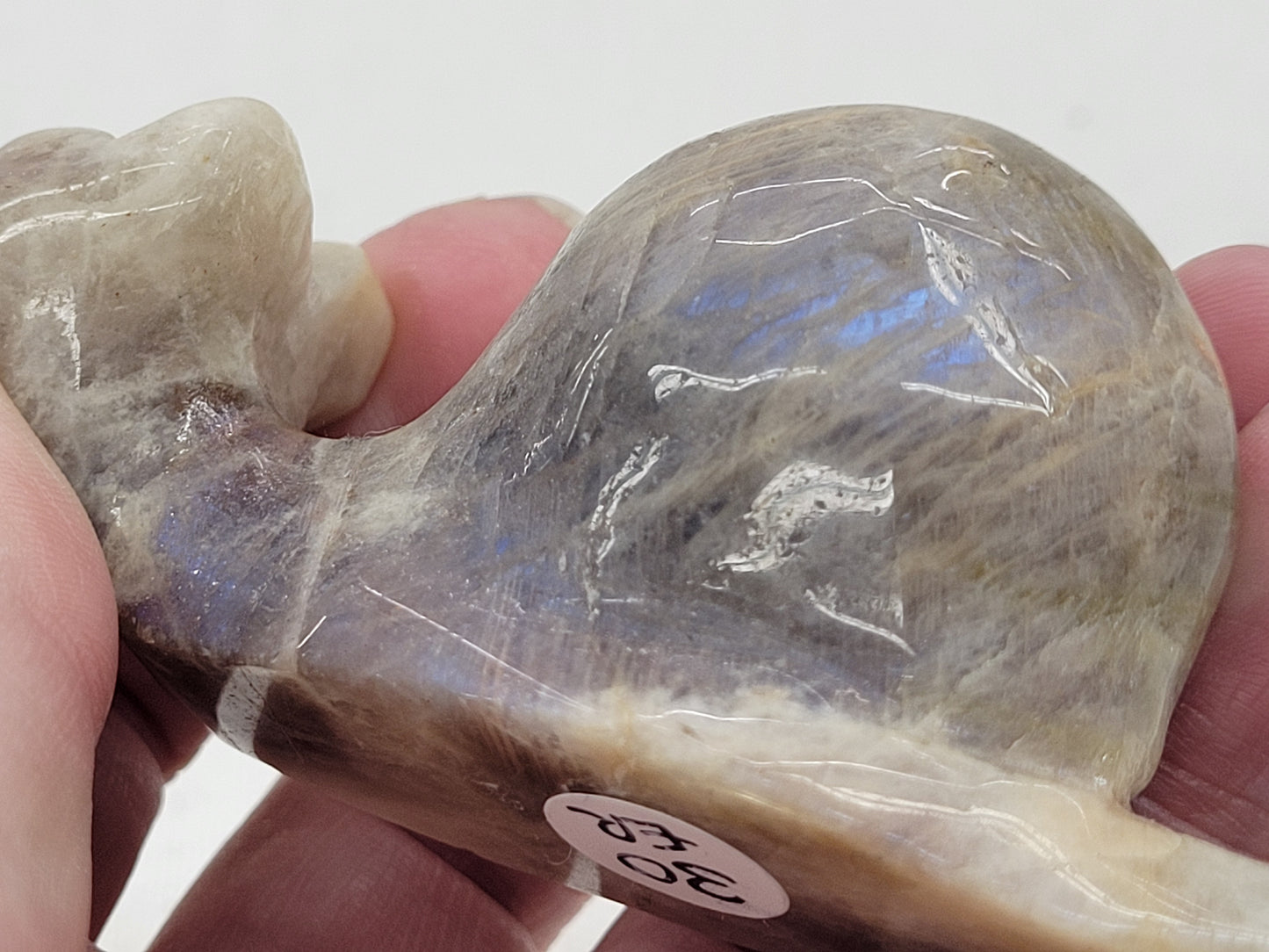 Moonstone snail carving