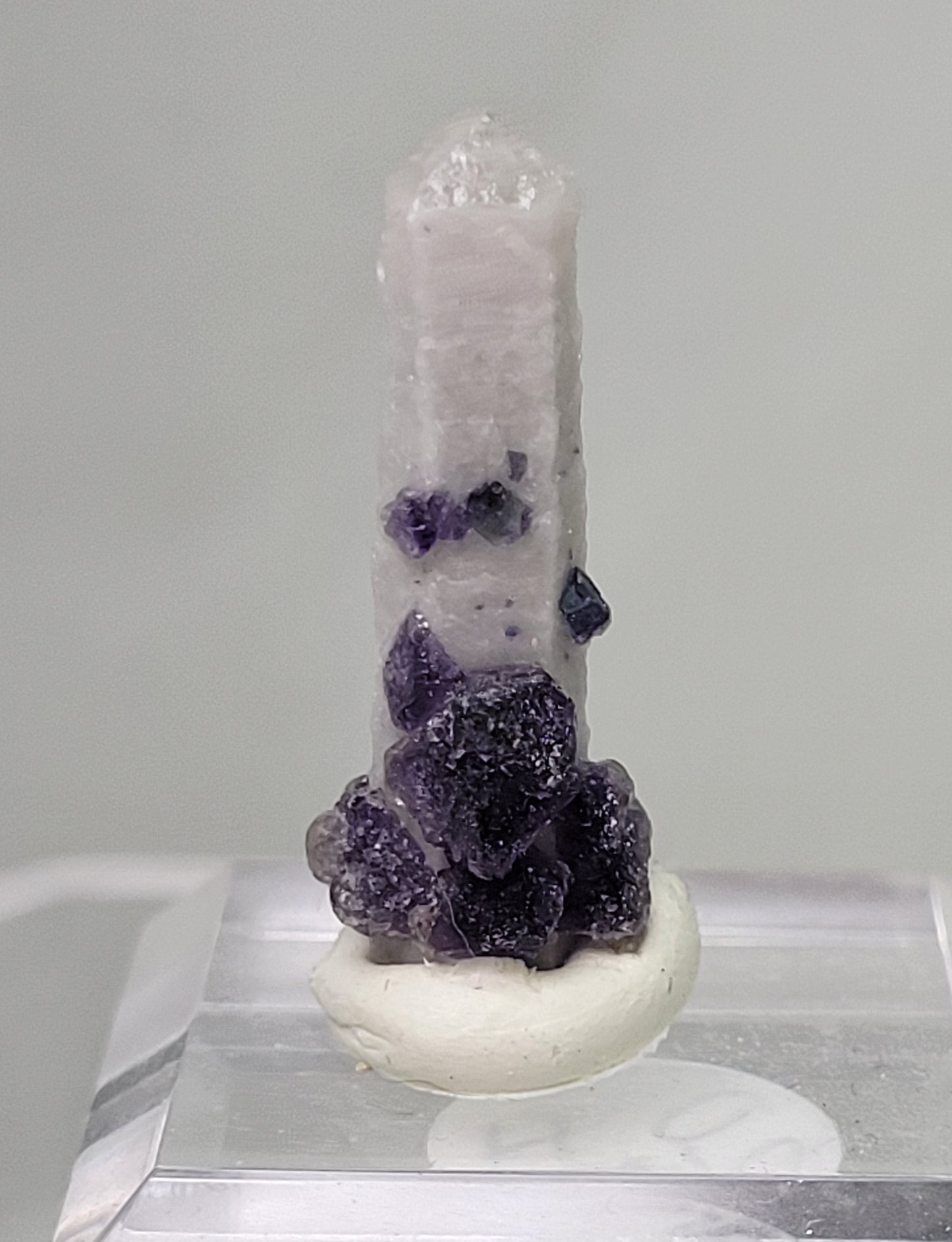 Fluorite on Candle Quartz - China