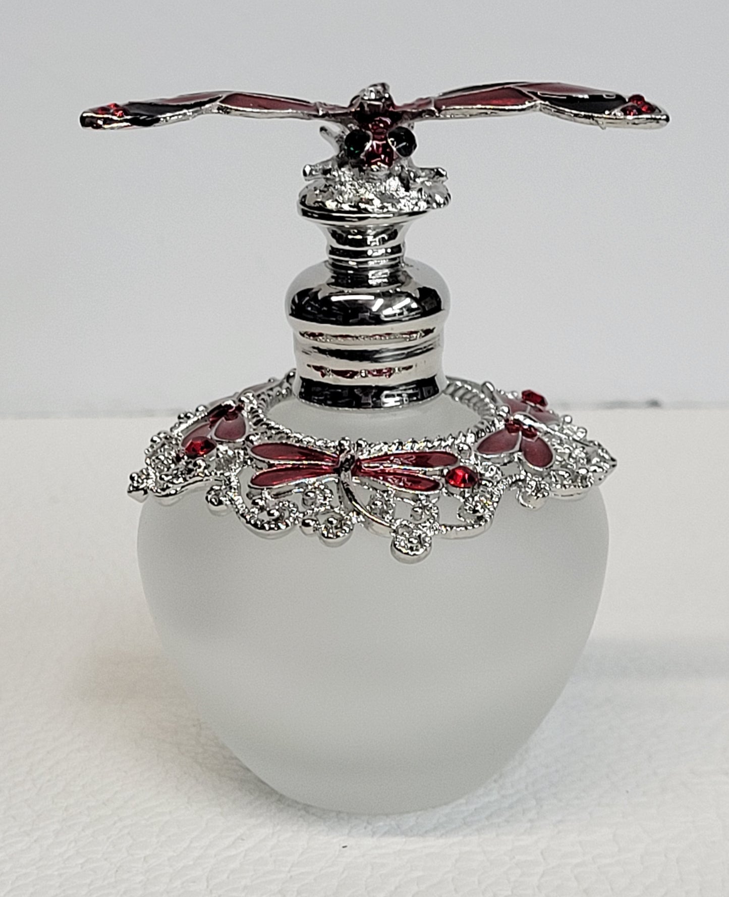Perfume bottle - Clear bottle w/ red & black dragonfly