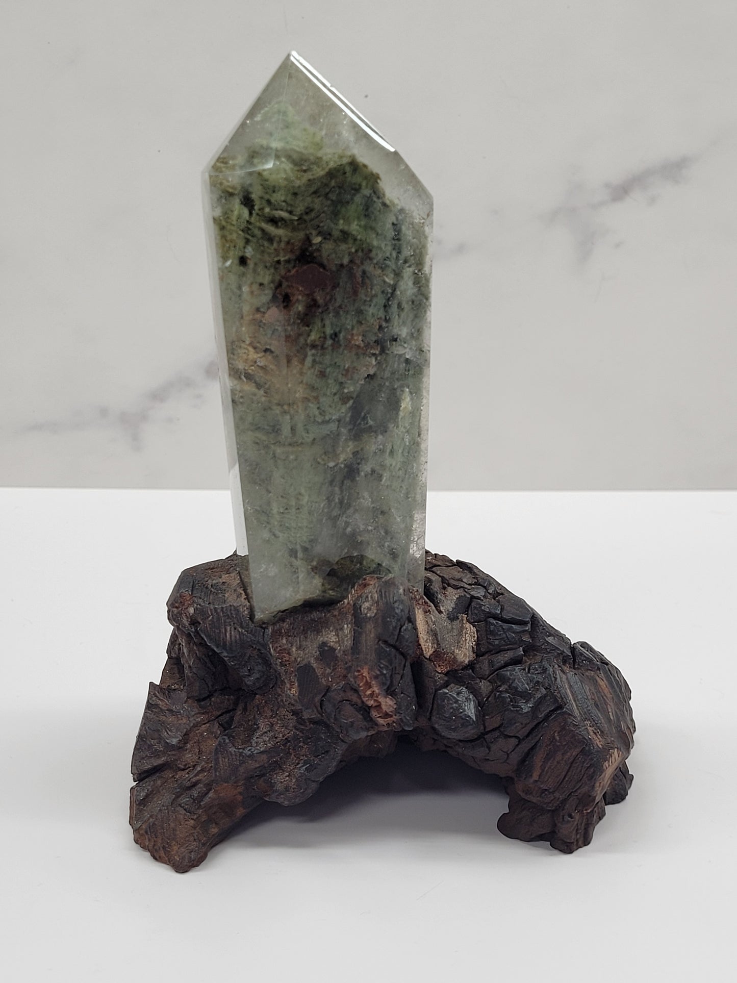 Garden Quartz statement towers on driftwood stand