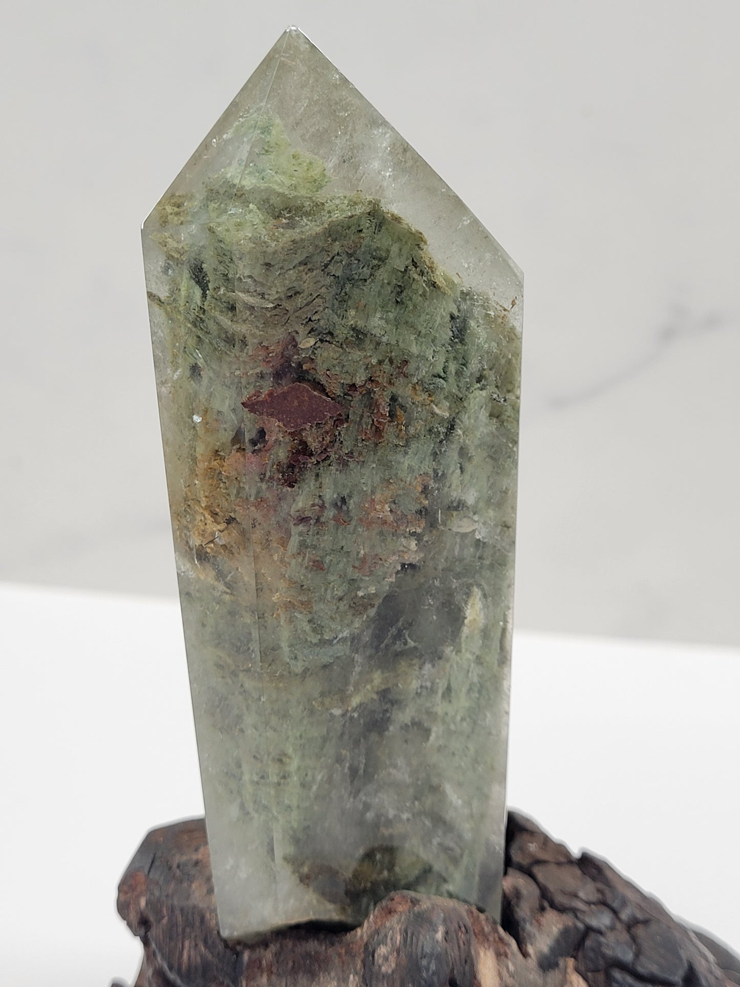 Garden Quartz statement towers on driftwood stand