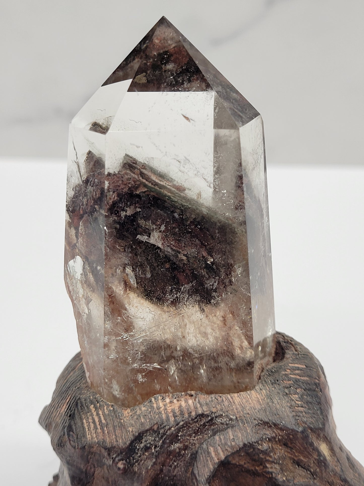 Garden Quartz statement towers on driftwood stand