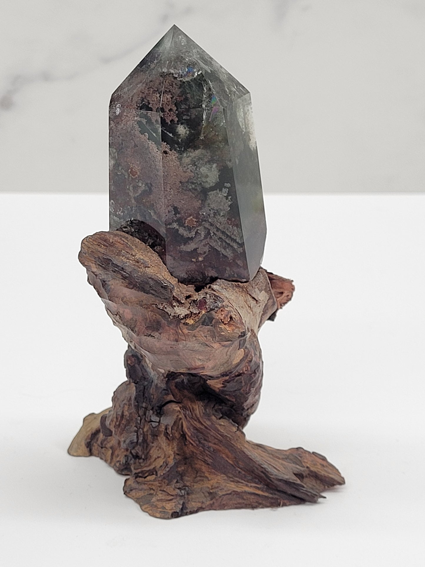 Garden Quartz statement towers on driftwood stand