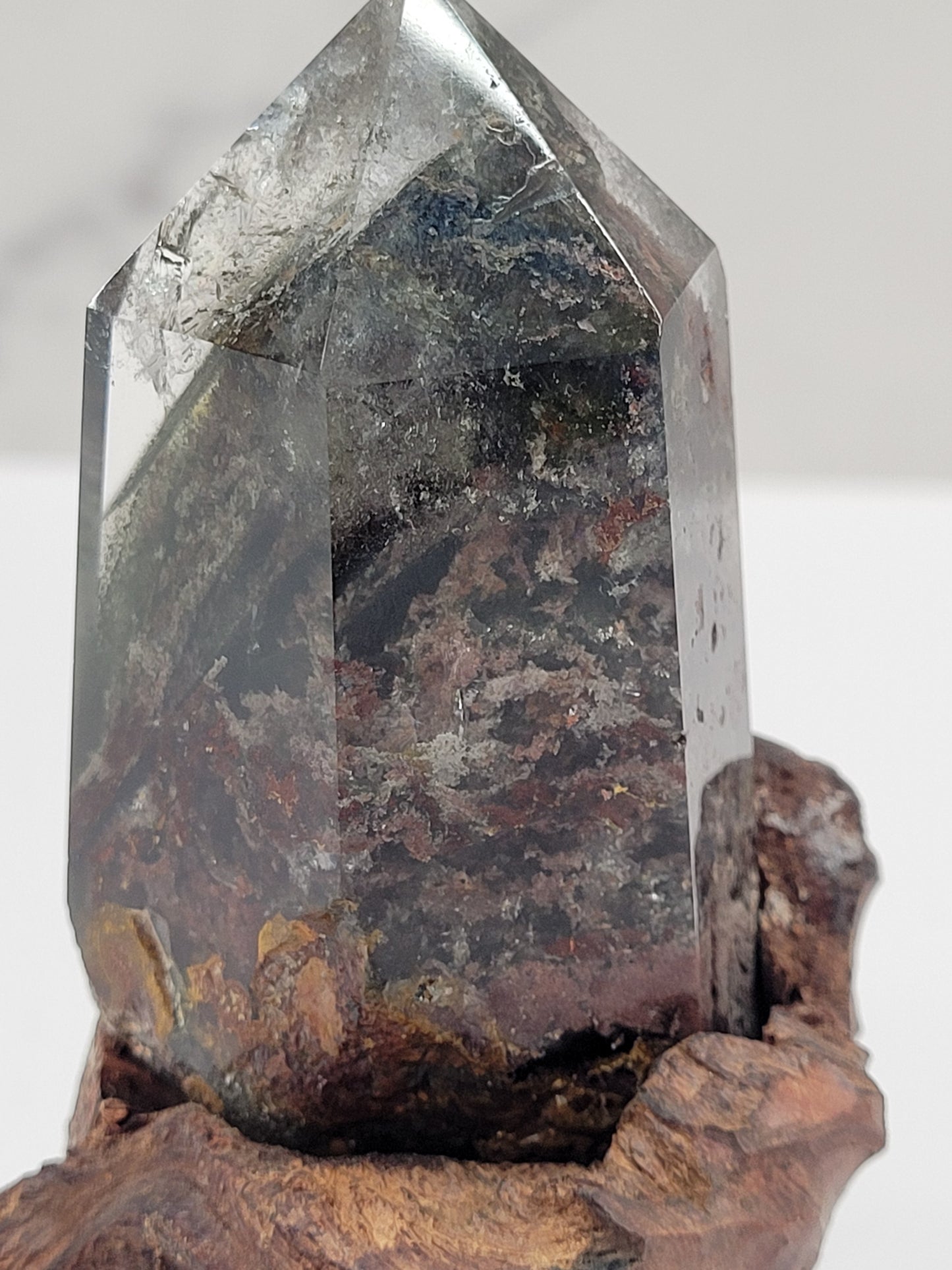 Garden Quartz statement towers on driftwood stand