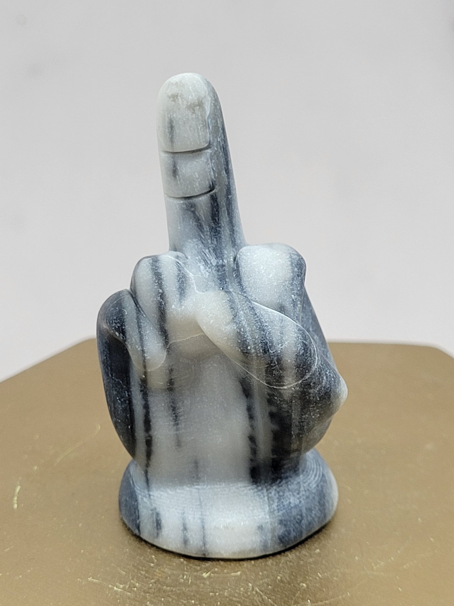Hand gesture - Middle finger carvings (Tai Chi)