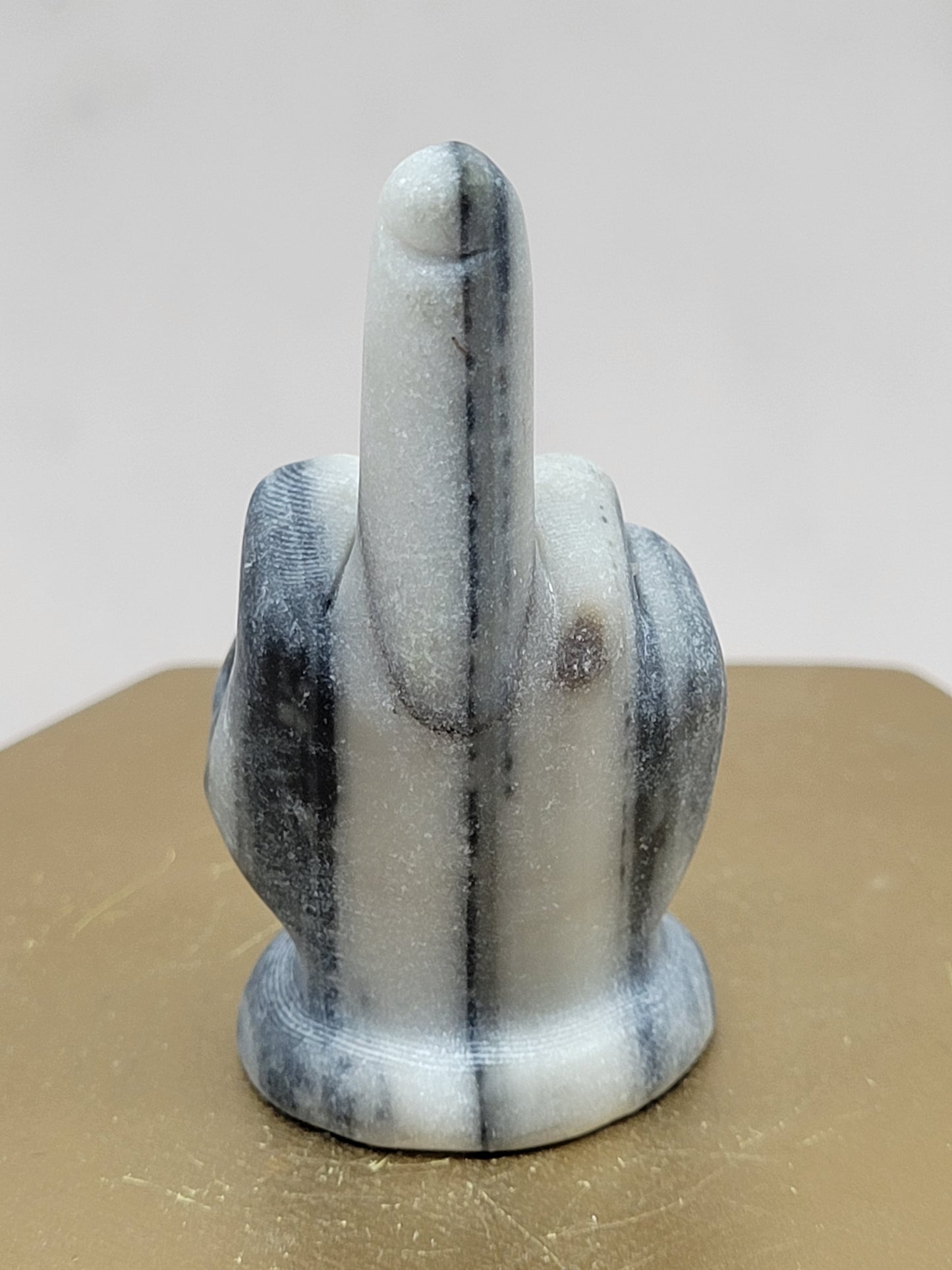 Hand gesture - Middle finger carvings (Tai Chi)