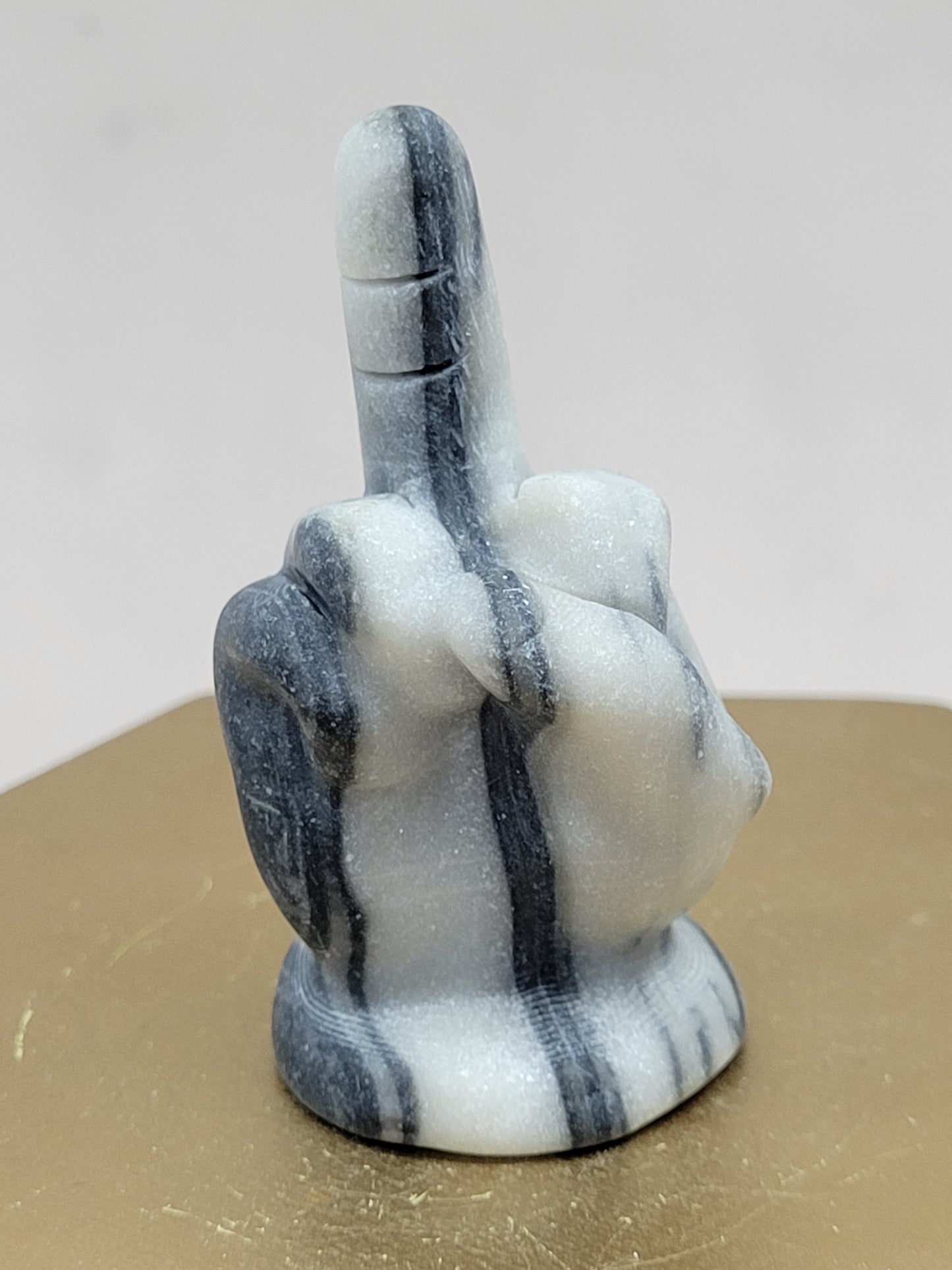 Hand gesture - Middle finger carvings (Tai Chi)