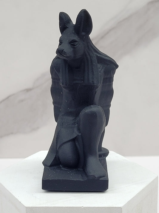 Anubis kneeling carving