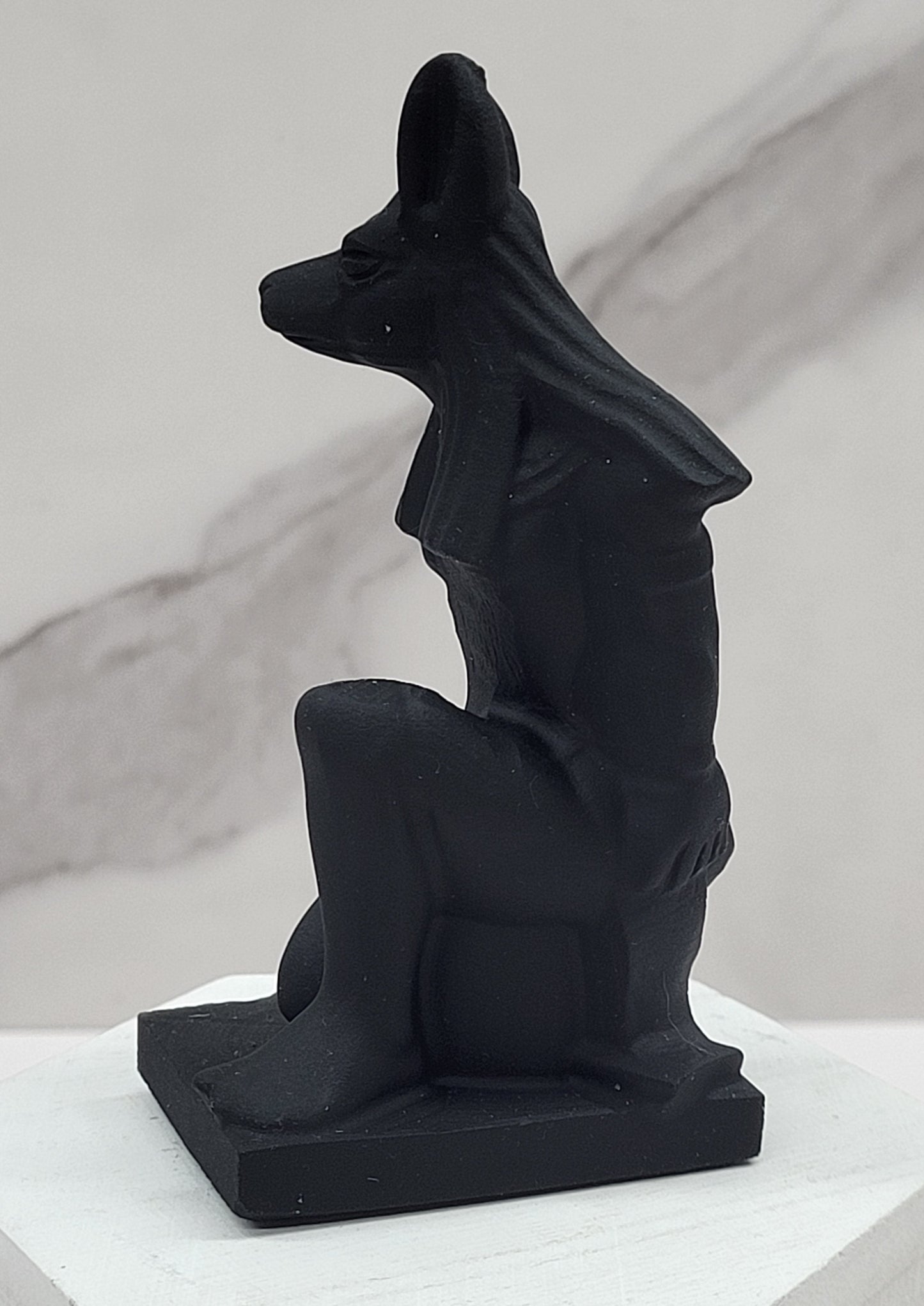 Anubis kneeling carving