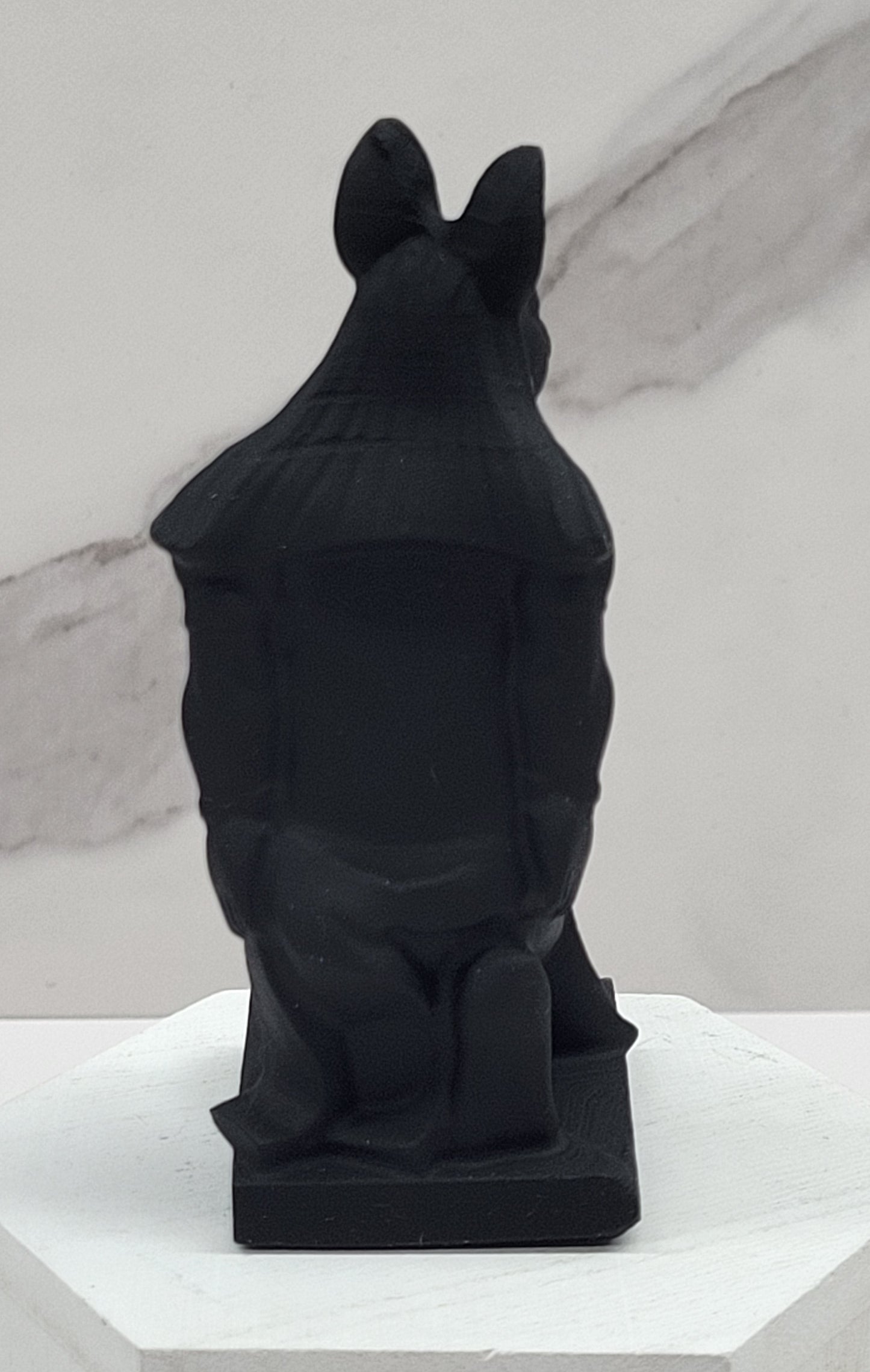Anubis kneeling carving