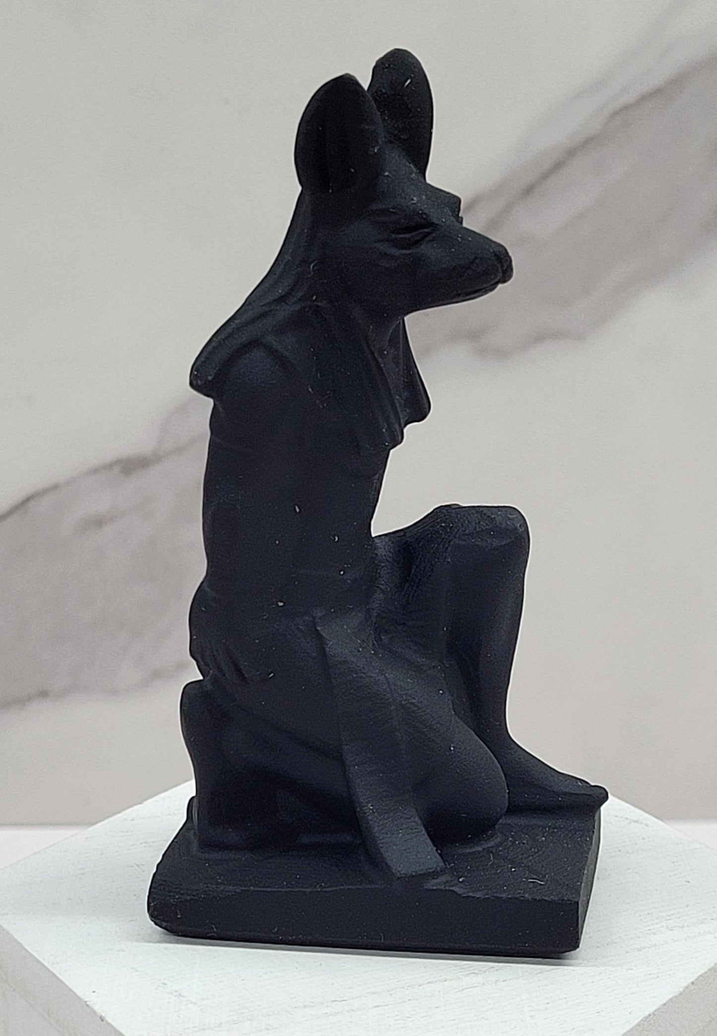 Anubis kneeling carving