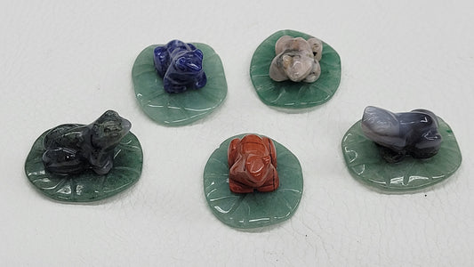 Frog on lily pad carvings