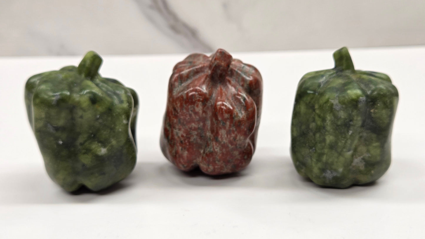 Vegetable carvings (pickle, carrot, pepper)
