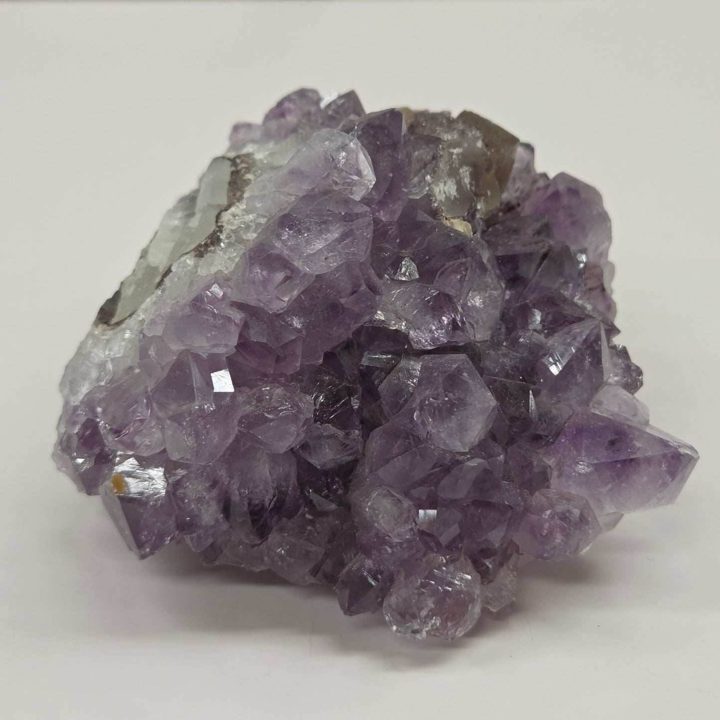 Amethyst cluster w/ calcite specimen