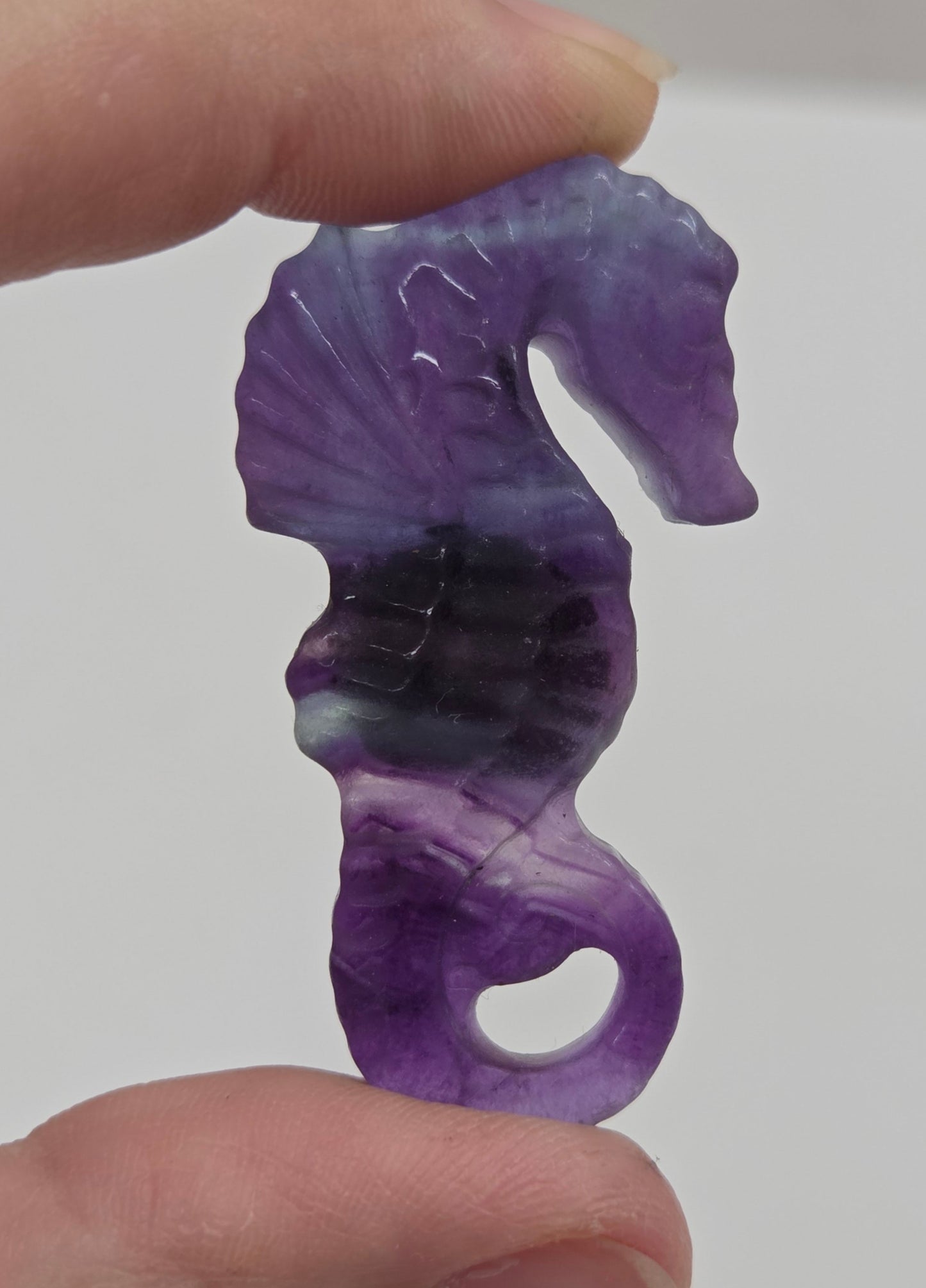 Fluorite seahorse carving