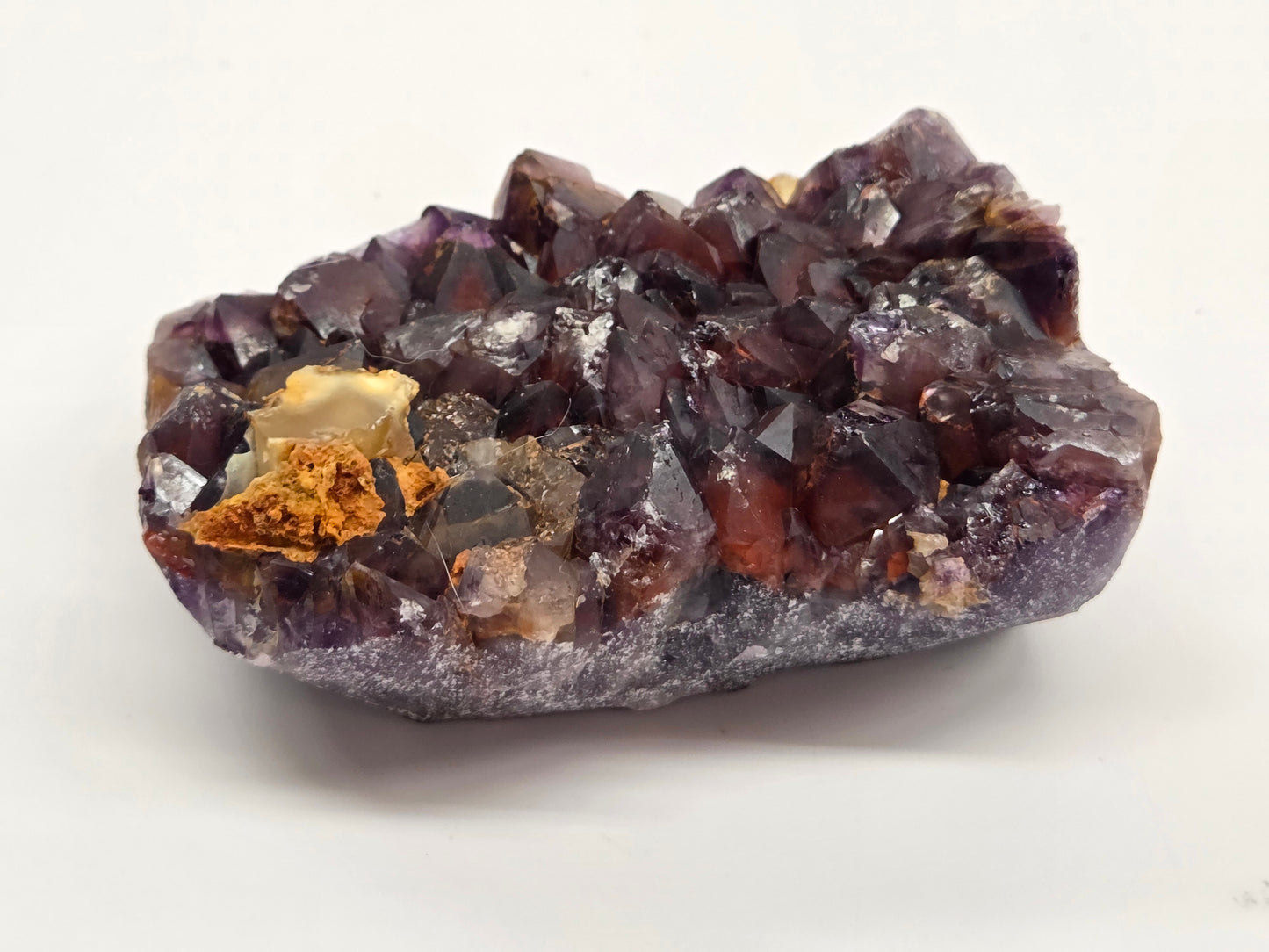 Hematite Included Amethyst clusters