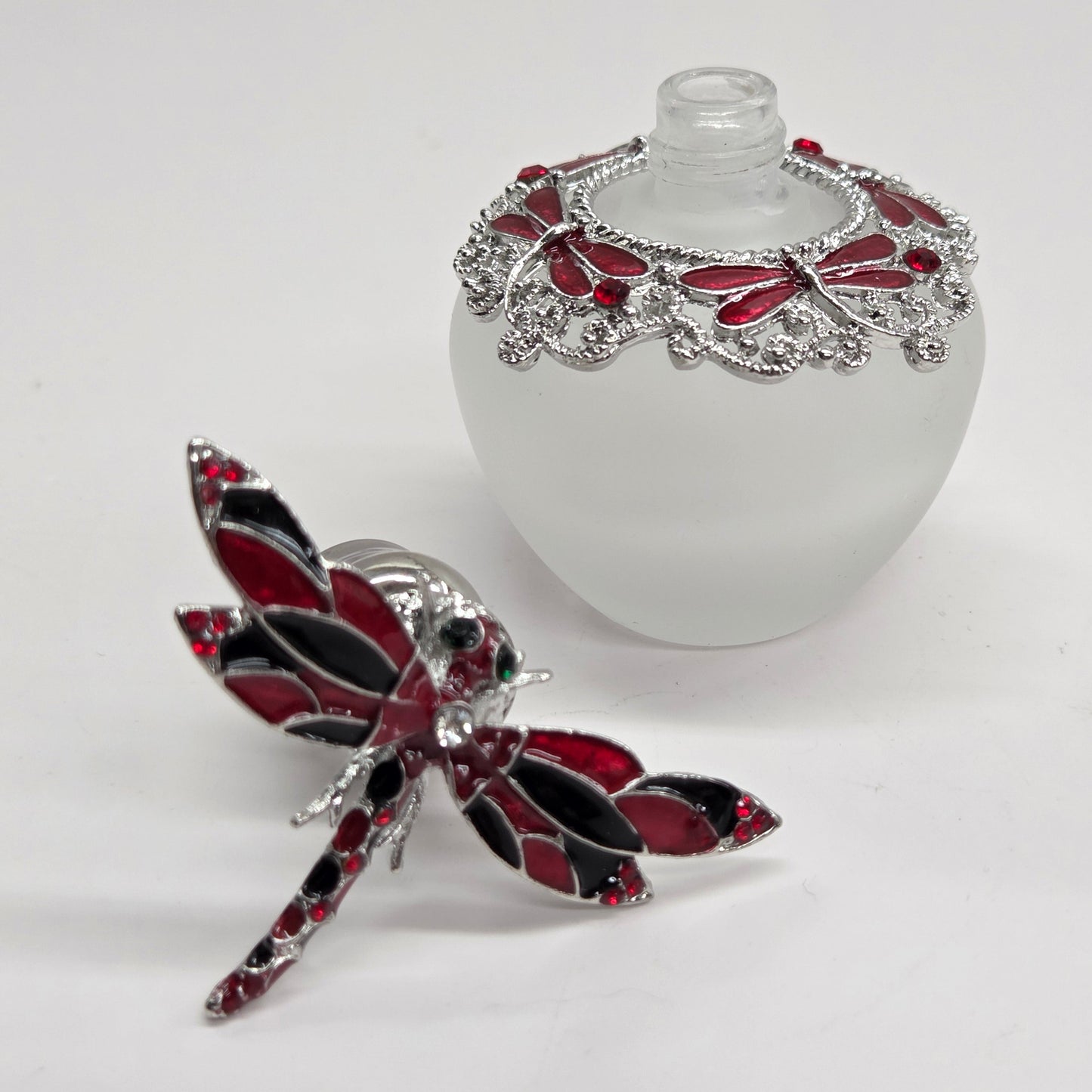 Perfume bottle - Clear bottle w/ red & black dragonfly