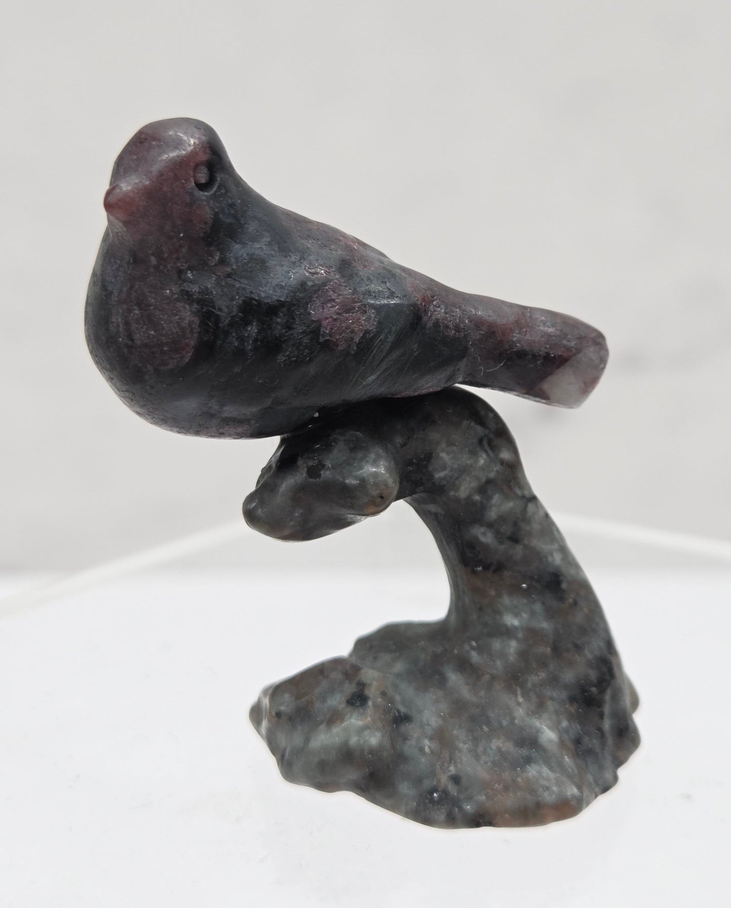 Bird on a limb carving