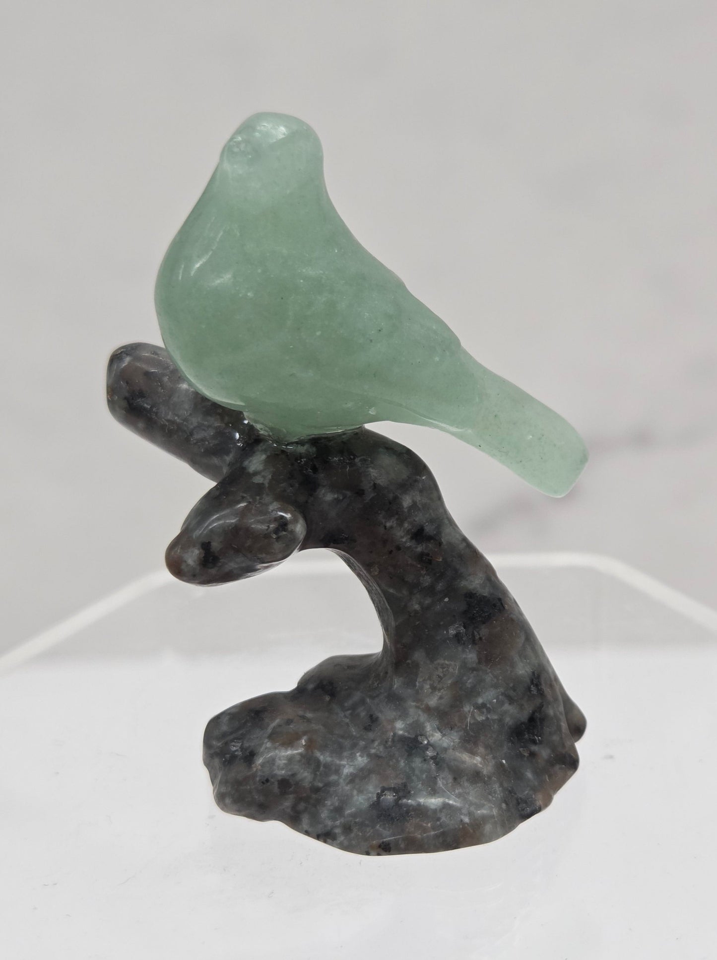 Bird on a limb carving