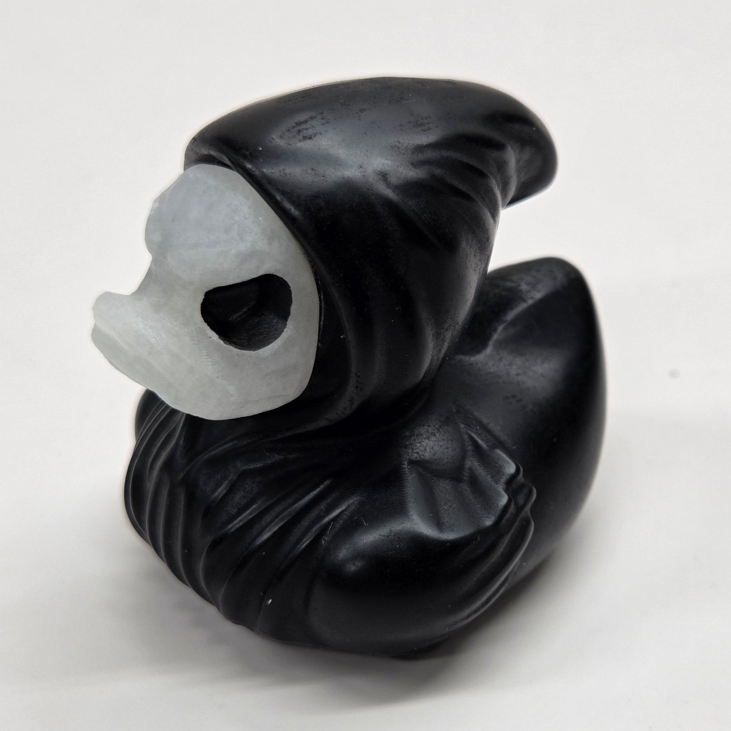 Hooded spooky duck carving