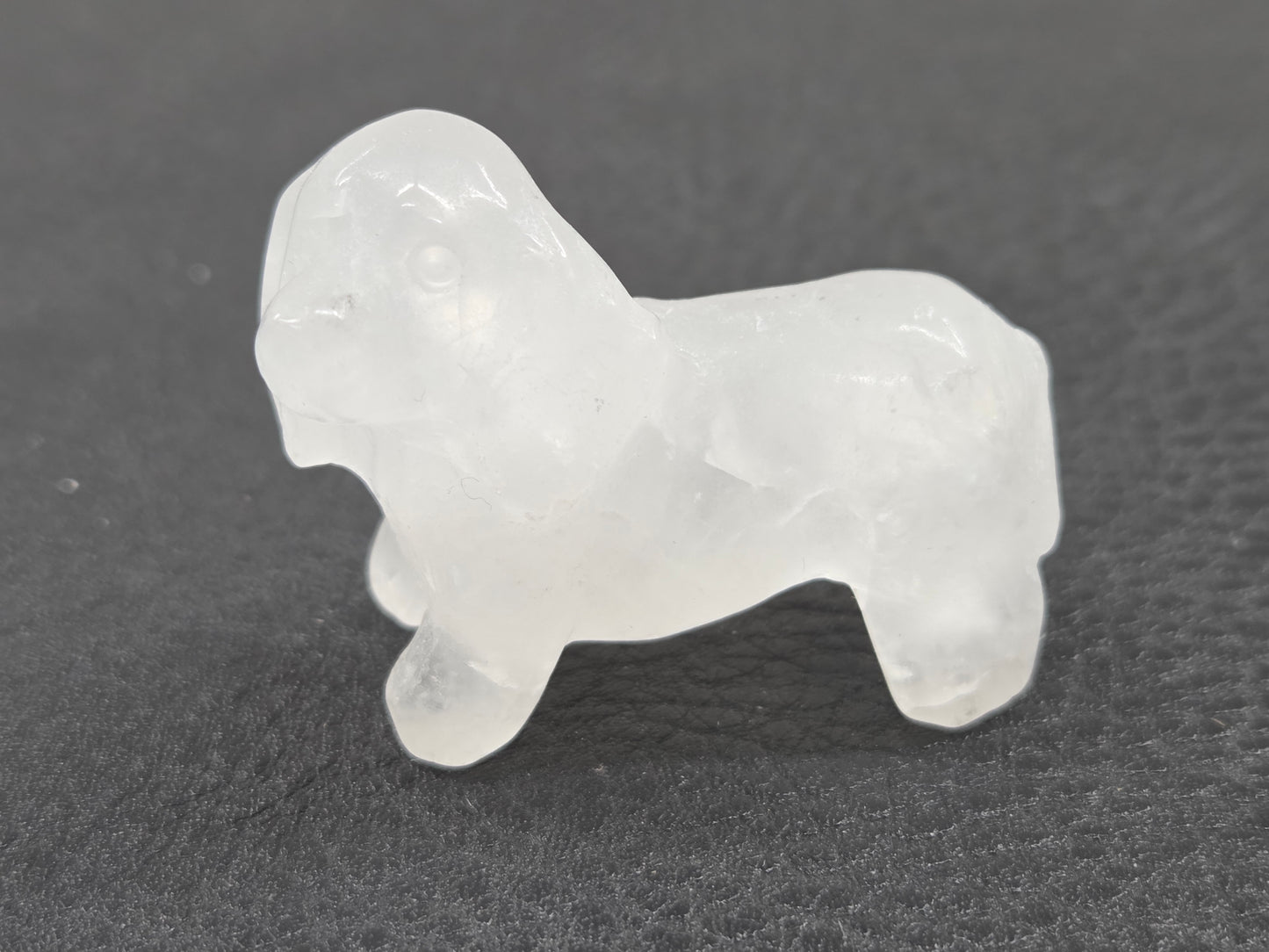 A small Dachshund dog carvings in Clear Quartz