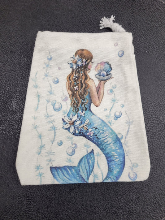 Cloth canvas bag featuring a mermaid on a black background