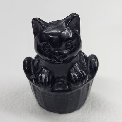 Cat in a basket carving