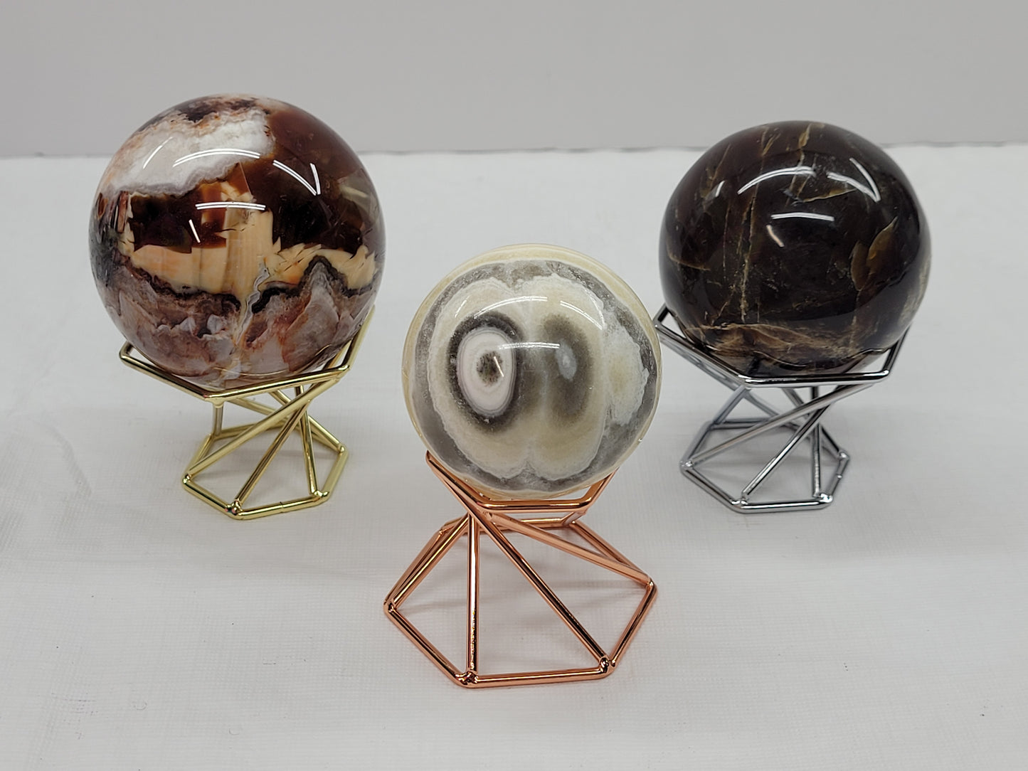 Double sided sphere stands