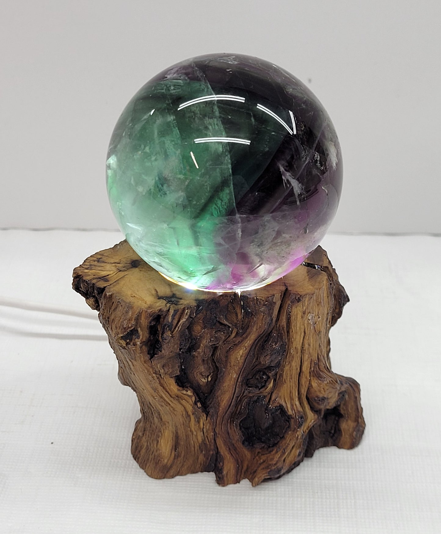 Lighted sphere stand - wood stump