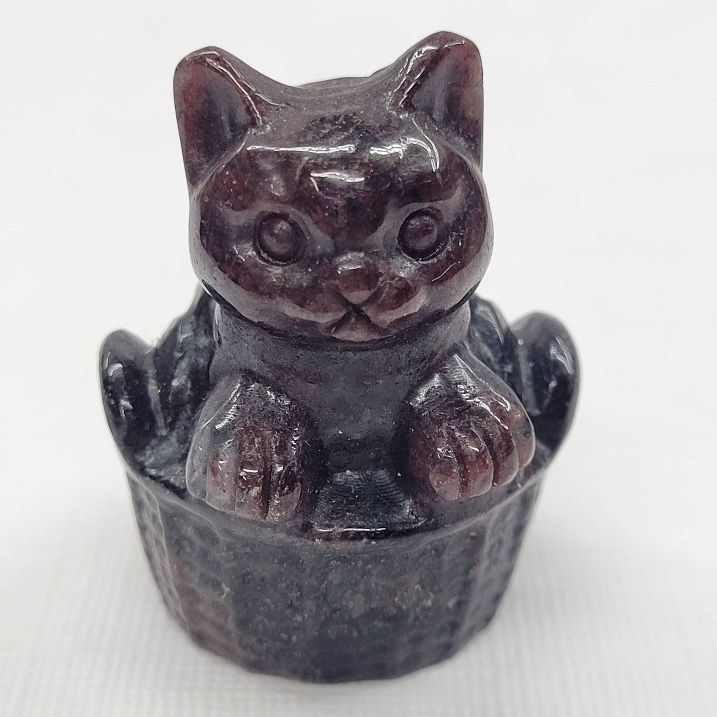 Cat in a basket carving