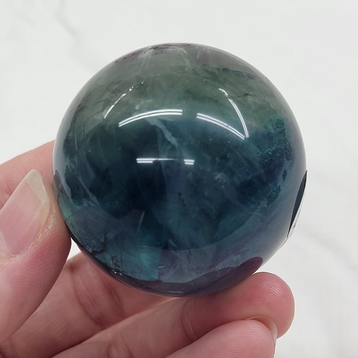 Feather Fluorite sphere