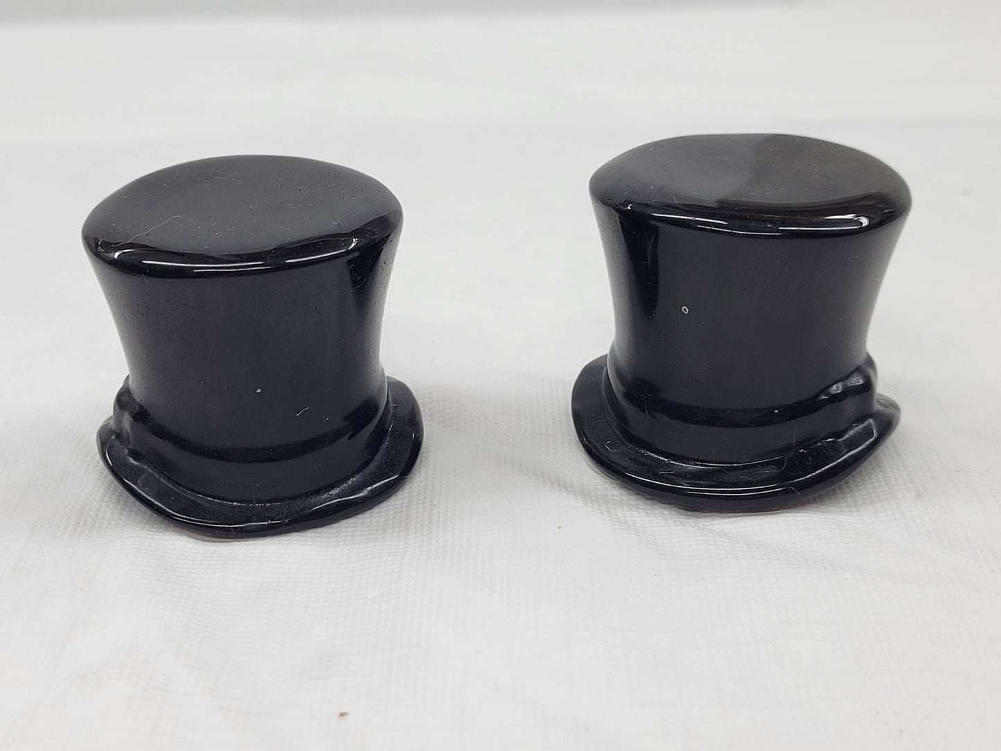 Obsidian top hat carving