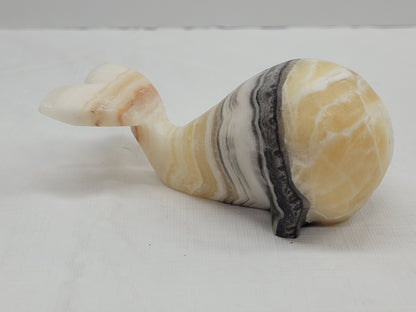 Calcite whale carvings