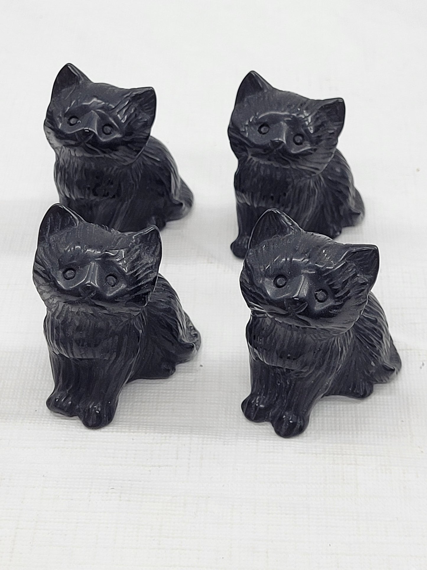 Black cat carvings