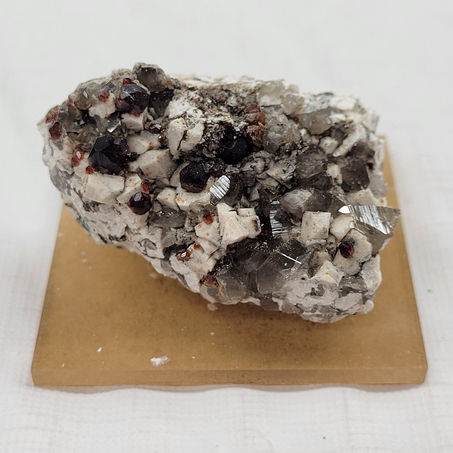 Garnet and Smoky Quartz on Feldspar