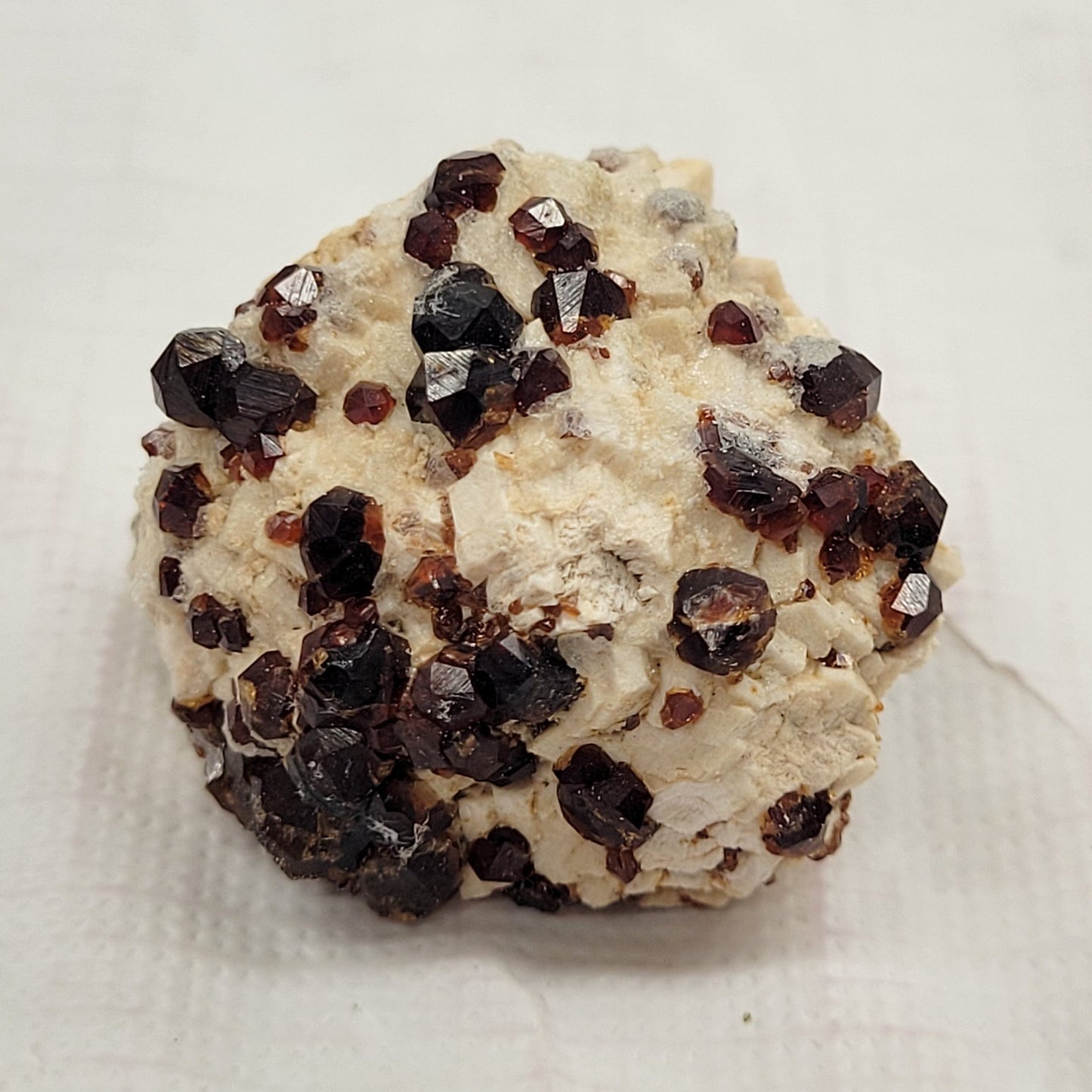 Garnet and Smoky Quartz on Feldspar