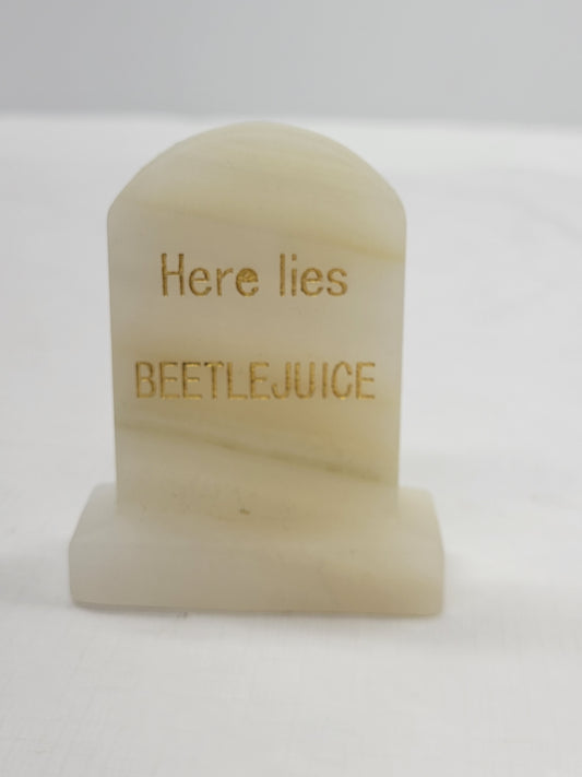 Tombstone carving in Afghan Jade, with Here Lies Beetlejuice wording