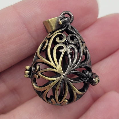 Brass sphere holder pendant