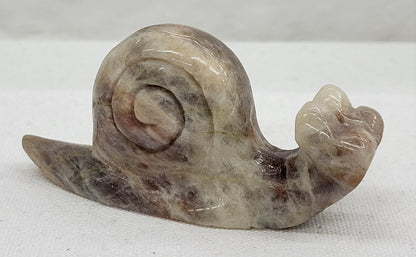 Moonstone snail carving